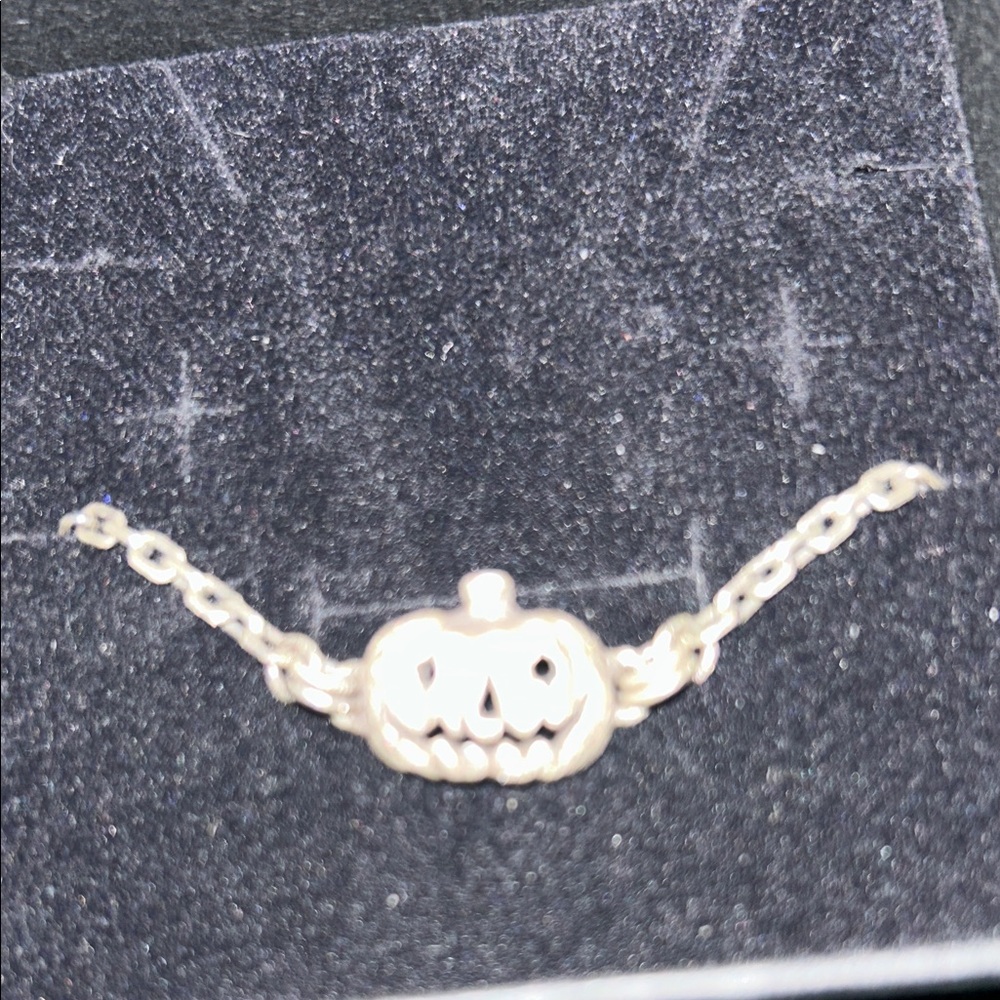 Uneven Jack o’lantern bracelet never worn